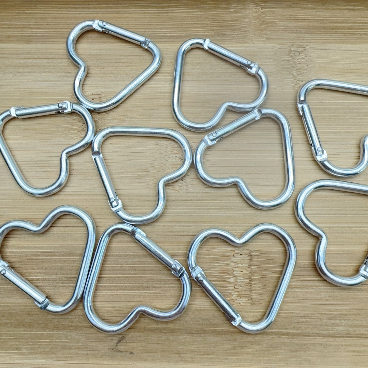 Tool-Sliver heart spring ring